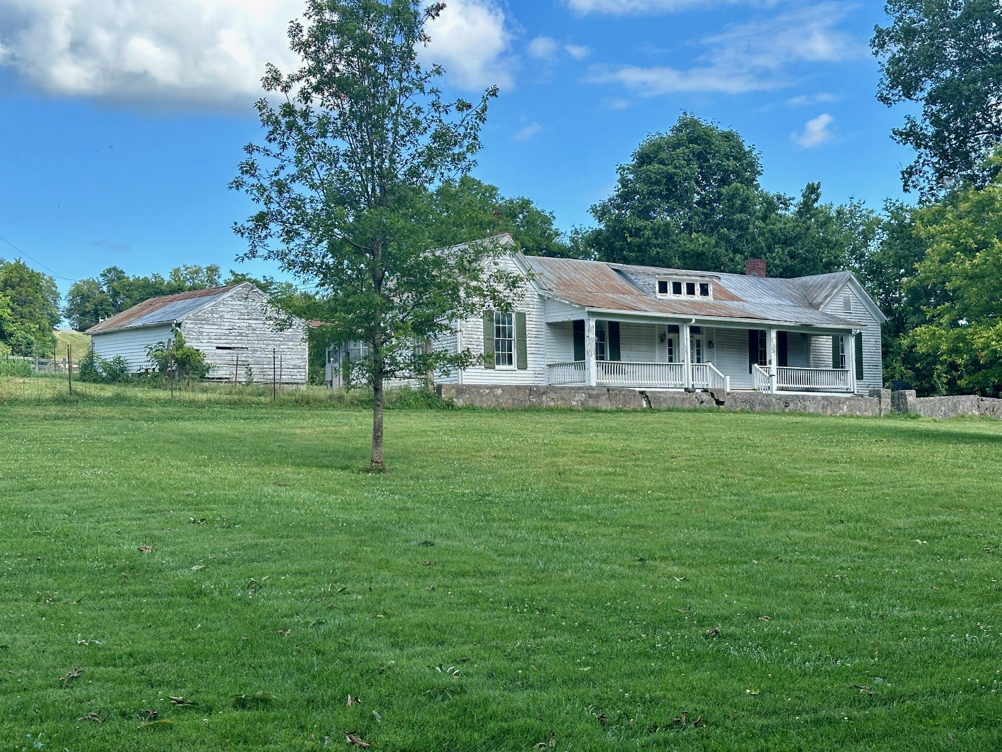 199 Knee Road Watertown, TN 37184 - Photo 57 of 70 a front view of a house with a yard