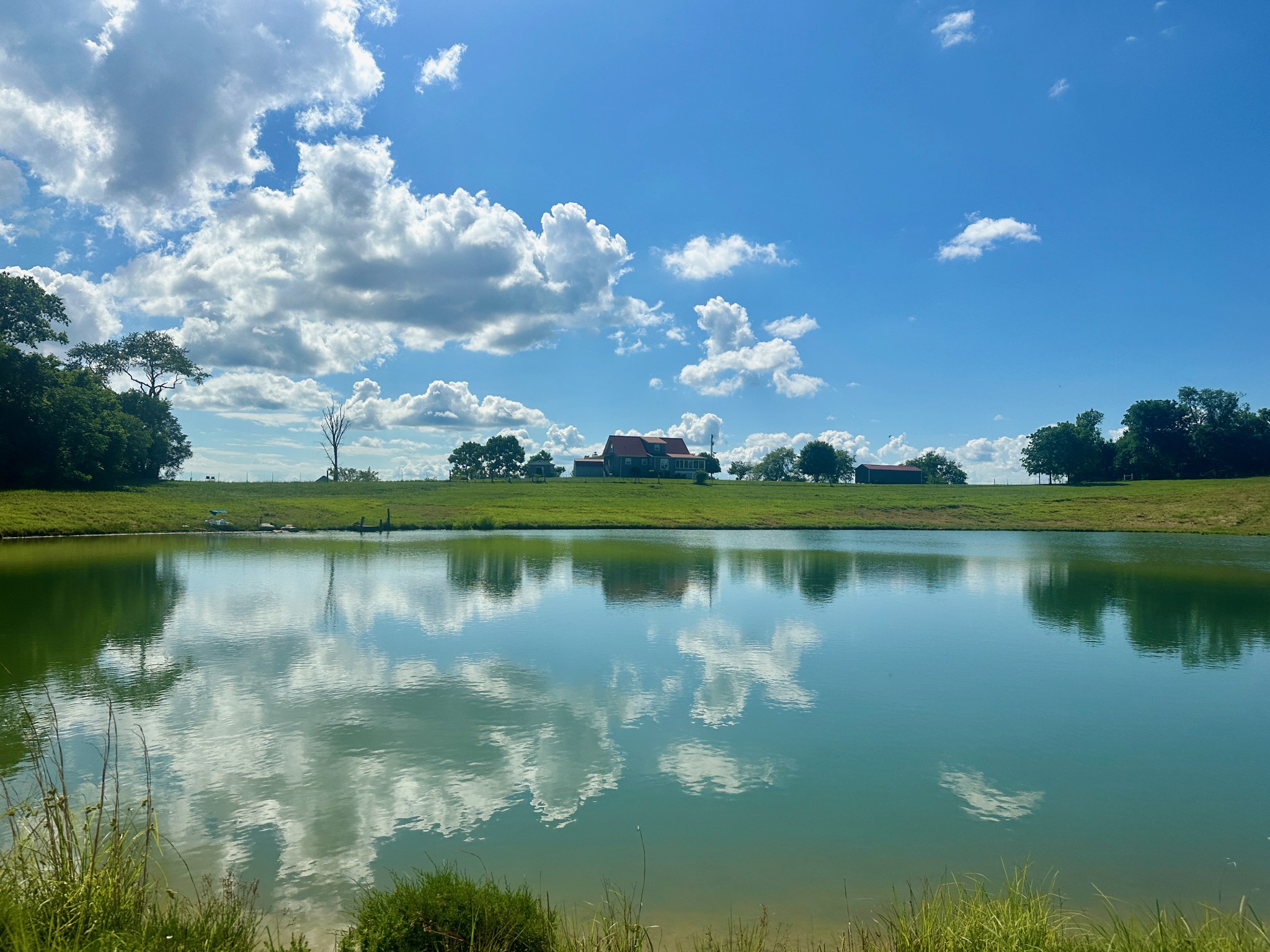 199 Knee Road Watertown, TN 37184 - Photo 6 of 70 a view of a lake in between two of trees