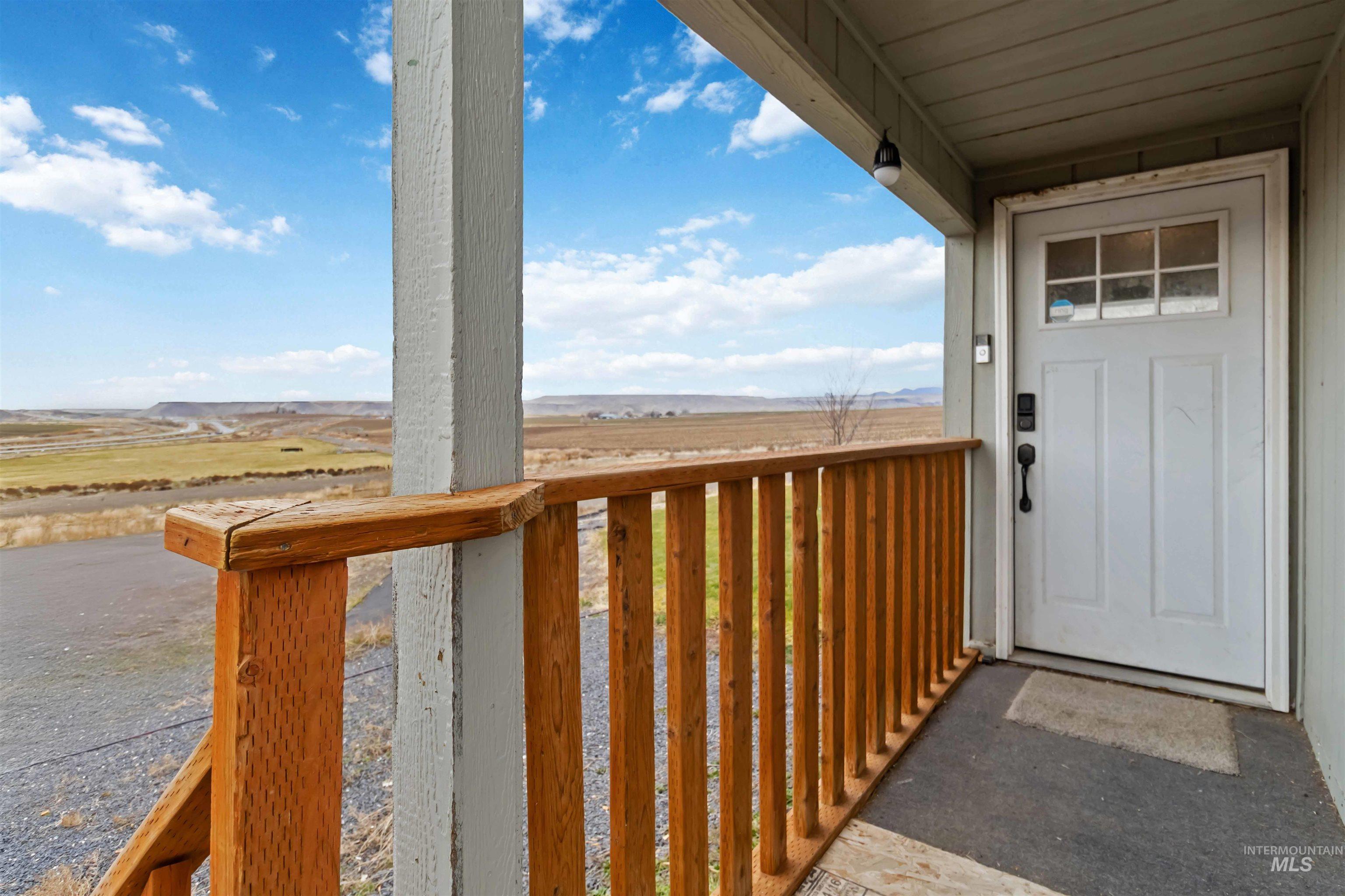 5827 East Little Basin Road King Hill, ID 83633 - Photo 2 of 47 Property entrance featuring a view of countryside
