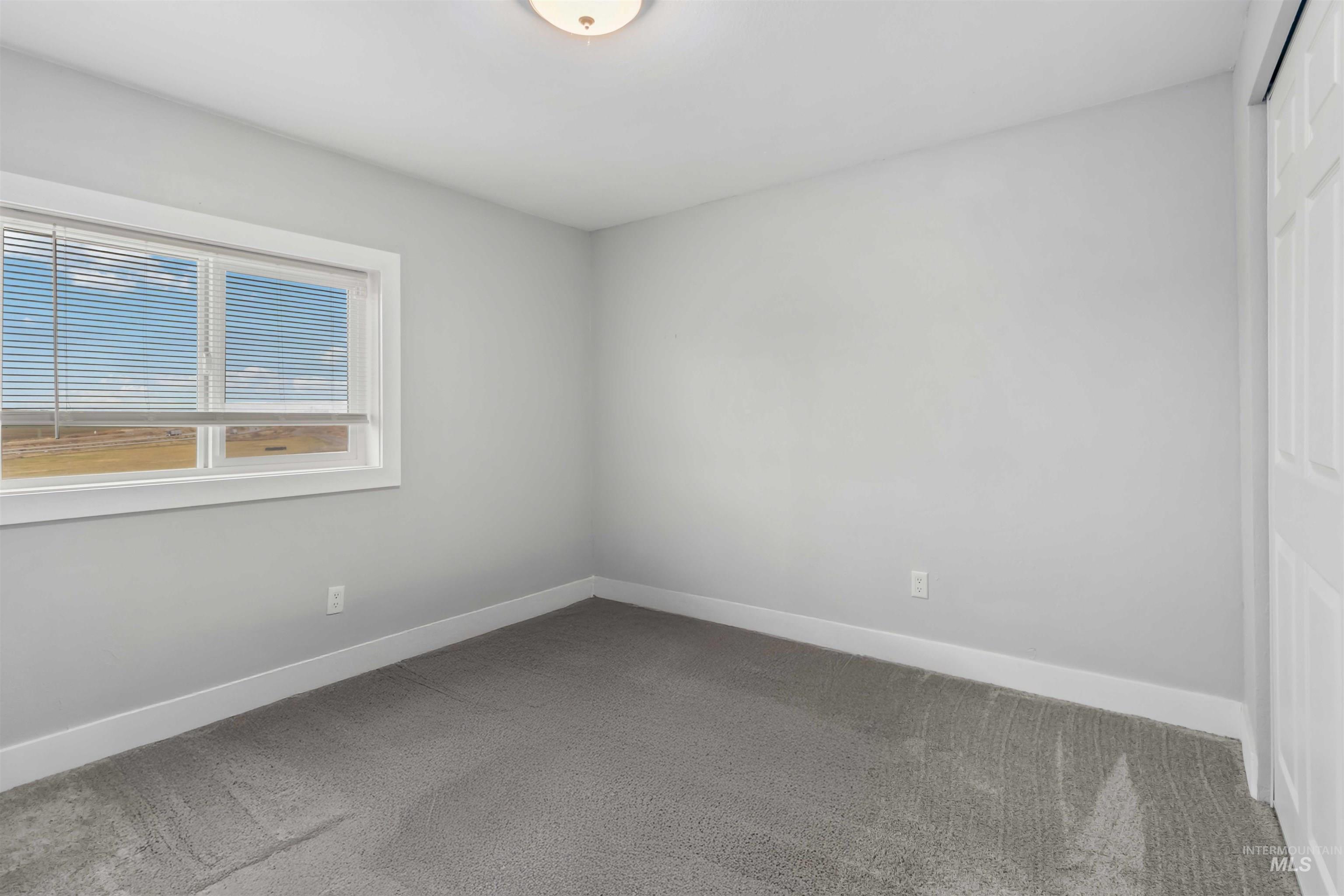 5827 East Little Basin Road King Hill, ID 83633 - Photo 28 of 47 Unfurnished room with carpet flooring