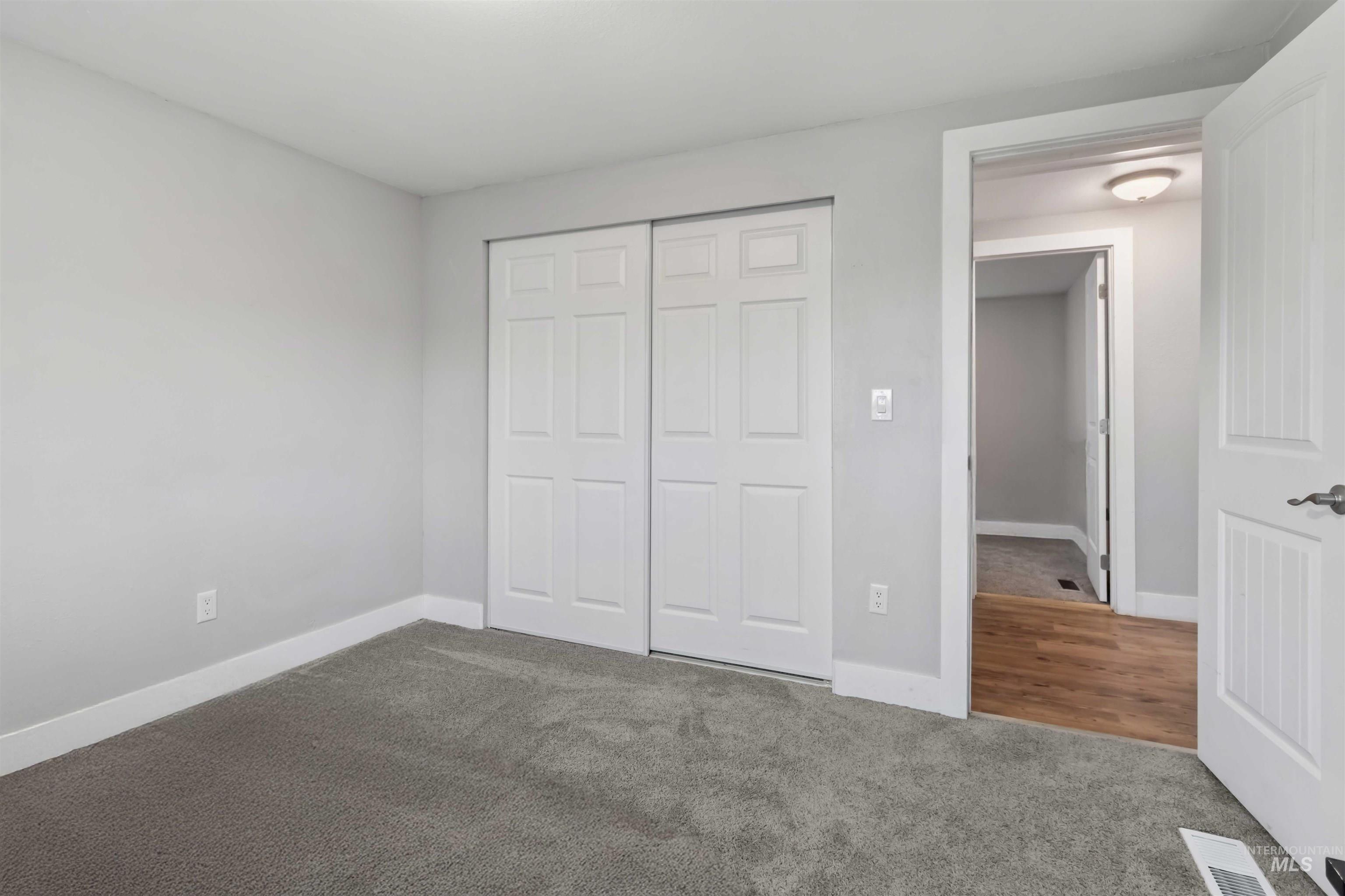 5827 East Little Basin Road King Hill, ID 83633 - Photo 29 of 47 Unfurnished bedroom featuring carpet and a closet
