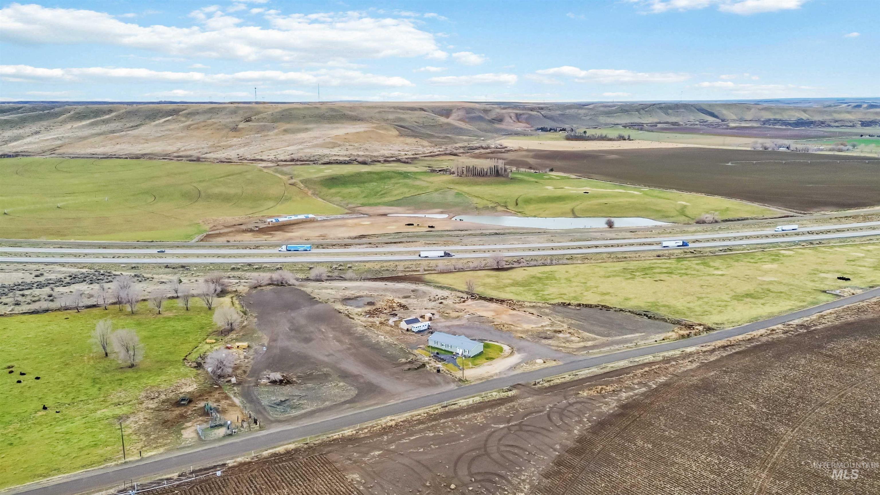 5827 East Little Basin Road King Hill, ID 83633 - Photo 33 of 47 Aerial view of property and surrounding area featuring rural landscape