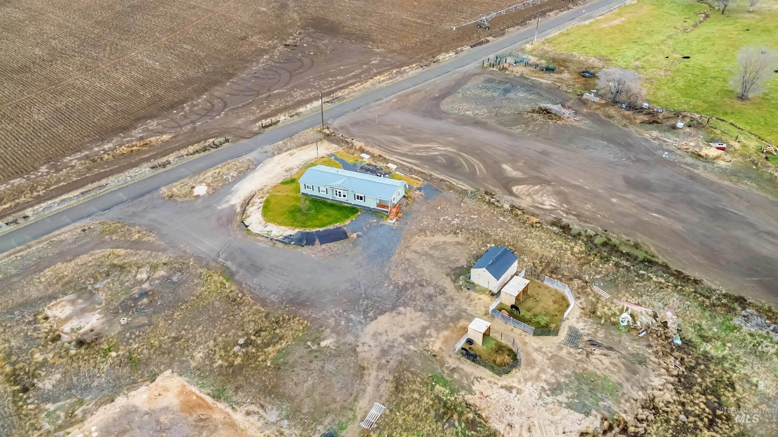 5827 East Little Basin Road King Hill, ID 83633 - Photo 46 of 47 Aerial view of property and surrounding area with rural landscape
