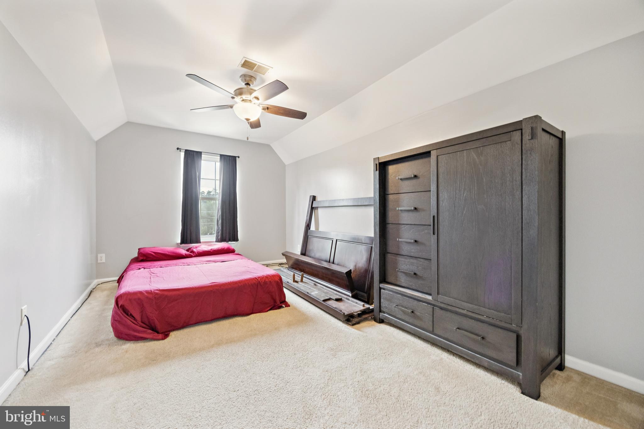 1285 Kearsley Road Sicklerville, NJ 08081 - Photo 21 of 34 a bedroom with a bed and a chandelier