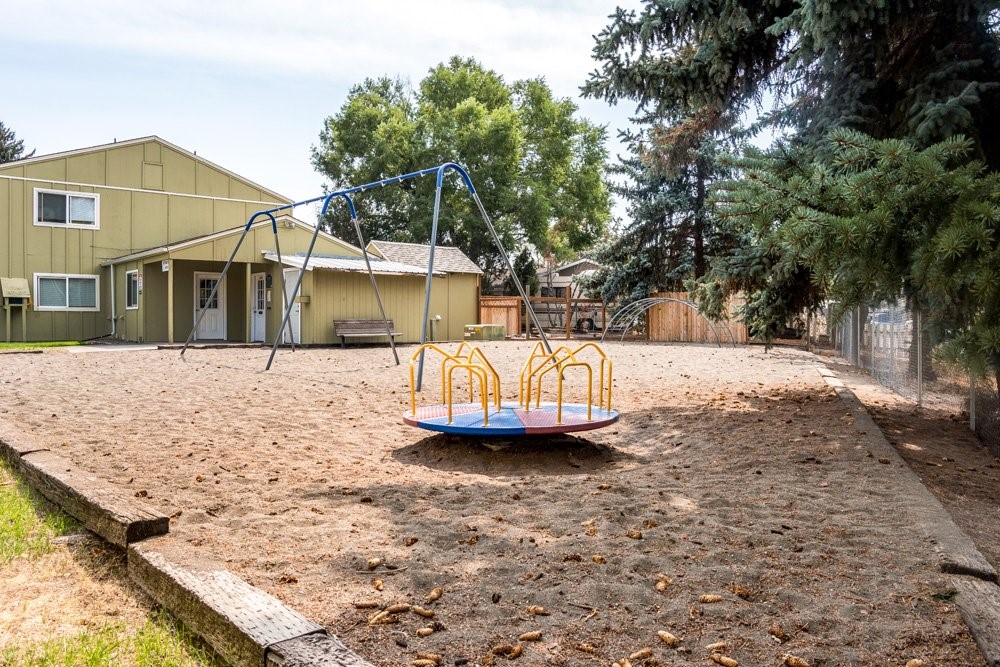 319 Southwest G Street Madras, OR 97741 - Photo 4 of 10 a view of a house with a snow in the yard