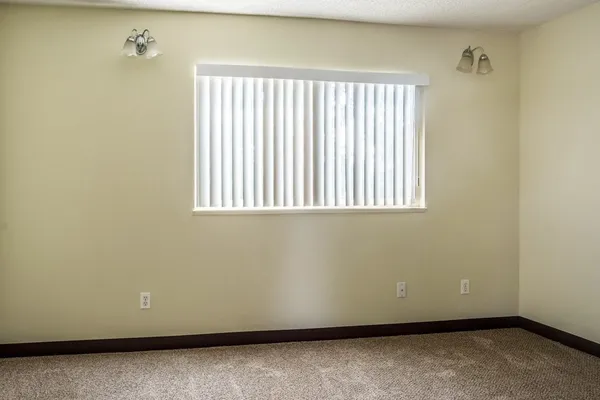 an empty room with a window