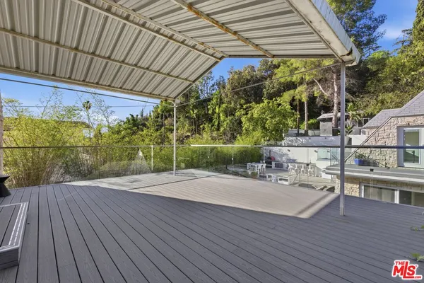 a view of a outdoor space with a patio