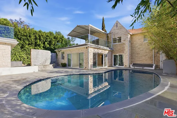 a house view with a outdoor space