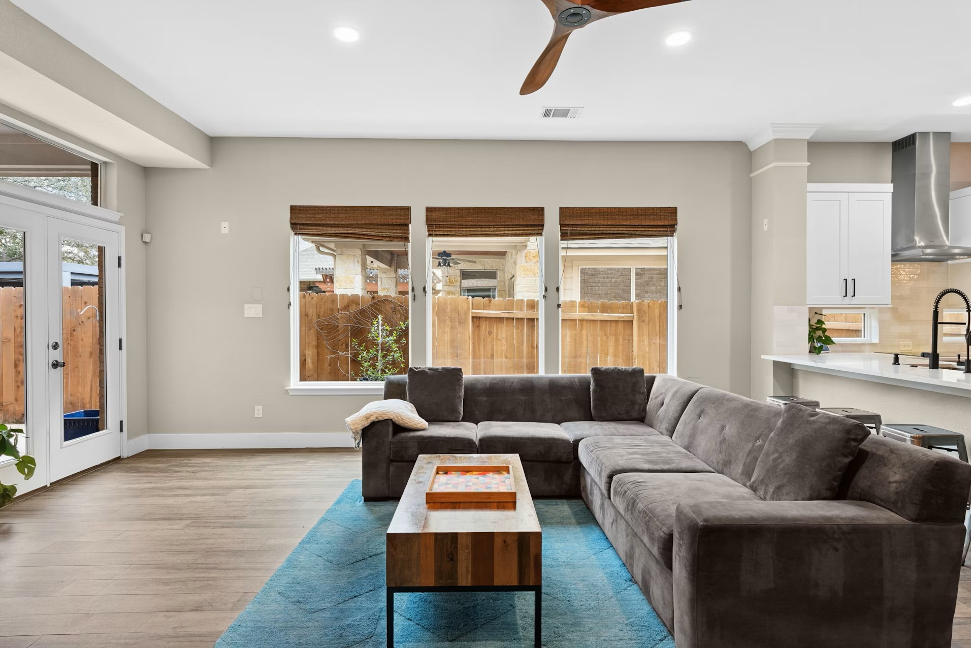 320 El Socorro Lane Austin, TX 78732 - Photo 26 of 40 a living room with furniture and a large window