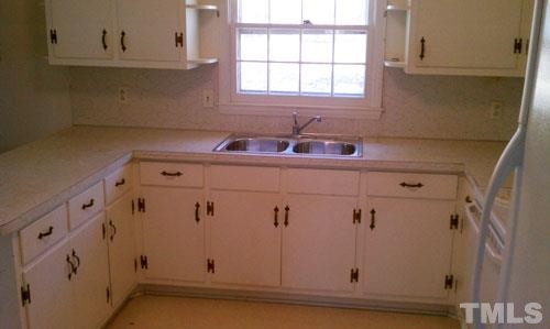 1007 Akron Avenue Durham, NC 27713 - Photo 3 of 8 a view of a kitchen with window