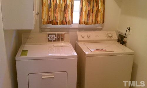 1007 Akron Avenue Durham, NC 27713 - Photo 8 of 8 a utility room with dryer and washer
