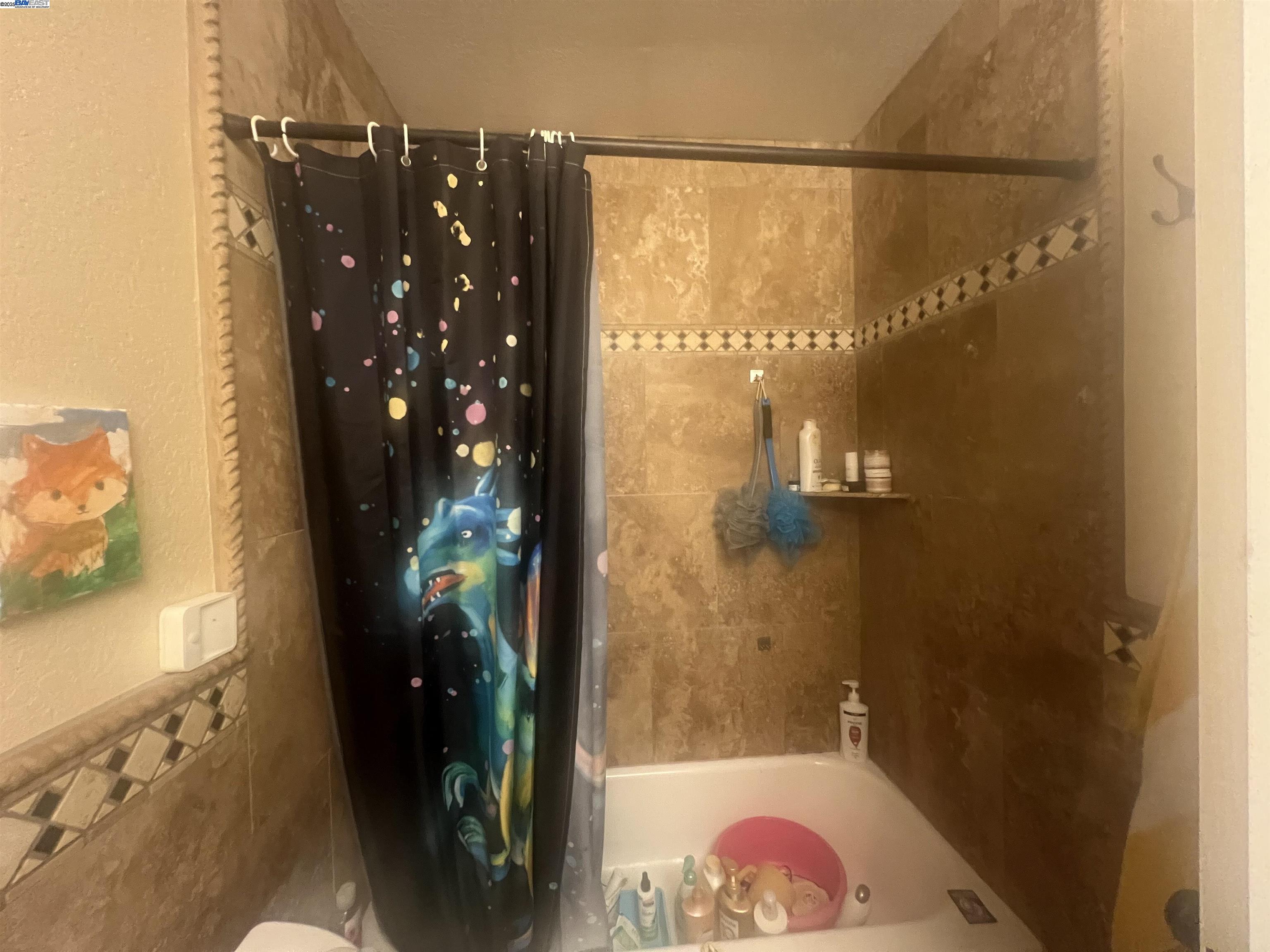 2155 Goldcrest Circle Pleasanton, CA 94566 - Photo 11 of 14 a bathroom with a glass shower door and a bathroom