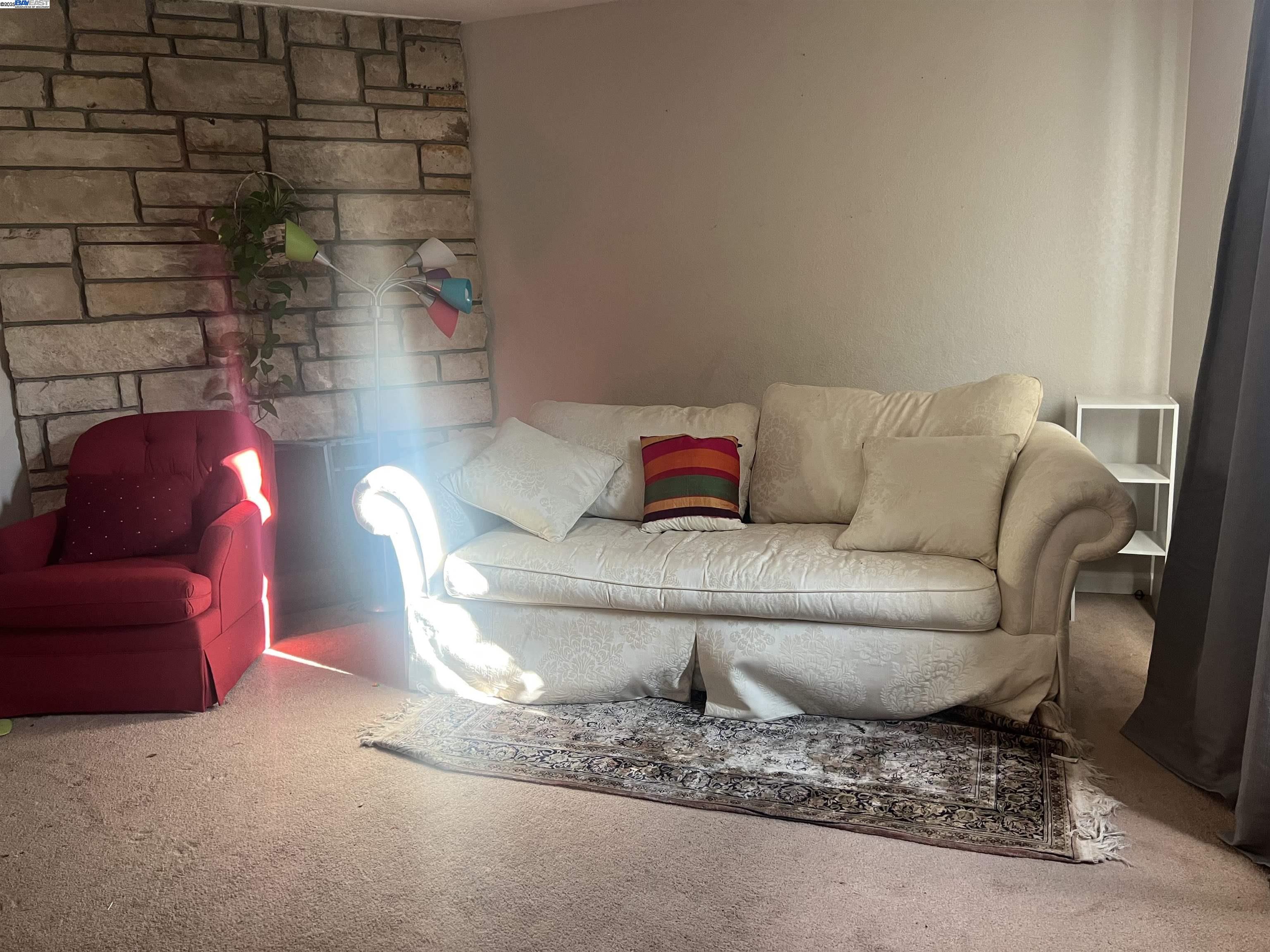 2155 Goldcrest Circle Pleasanton, CA 94566 - Photo 3 of 14 a living room with furniture and a couch