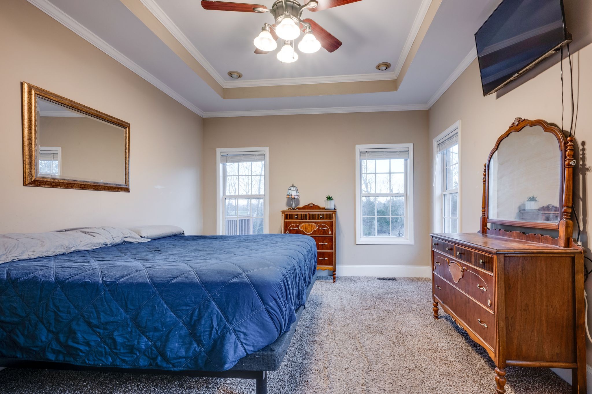 754 Hafner Road Charlotte, TN 37036 - Photo 24 of 54 a bedroom with a bed and window