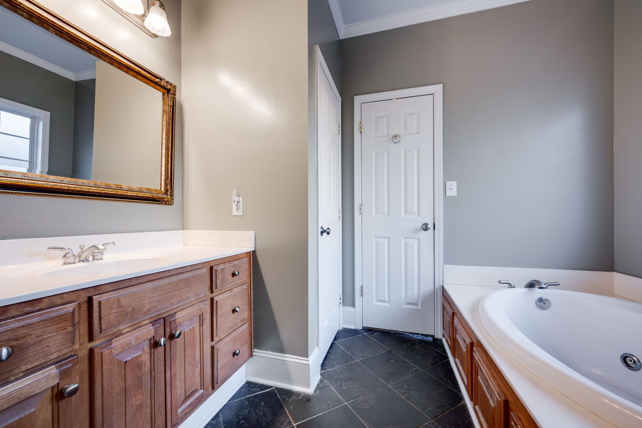 754 Hafner Road Charlotte, TN 37036 - Photo 25 of 54 a bathroom with a bathtub and a sink