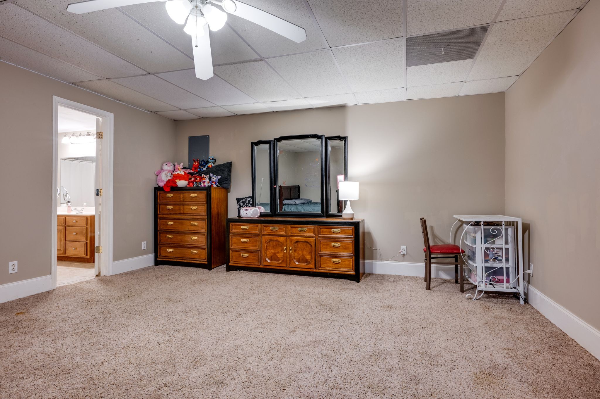 754 Hafner Road Charlotte, TN 37036 - Photo 36 of 54 a living room with furniture and a baby crib