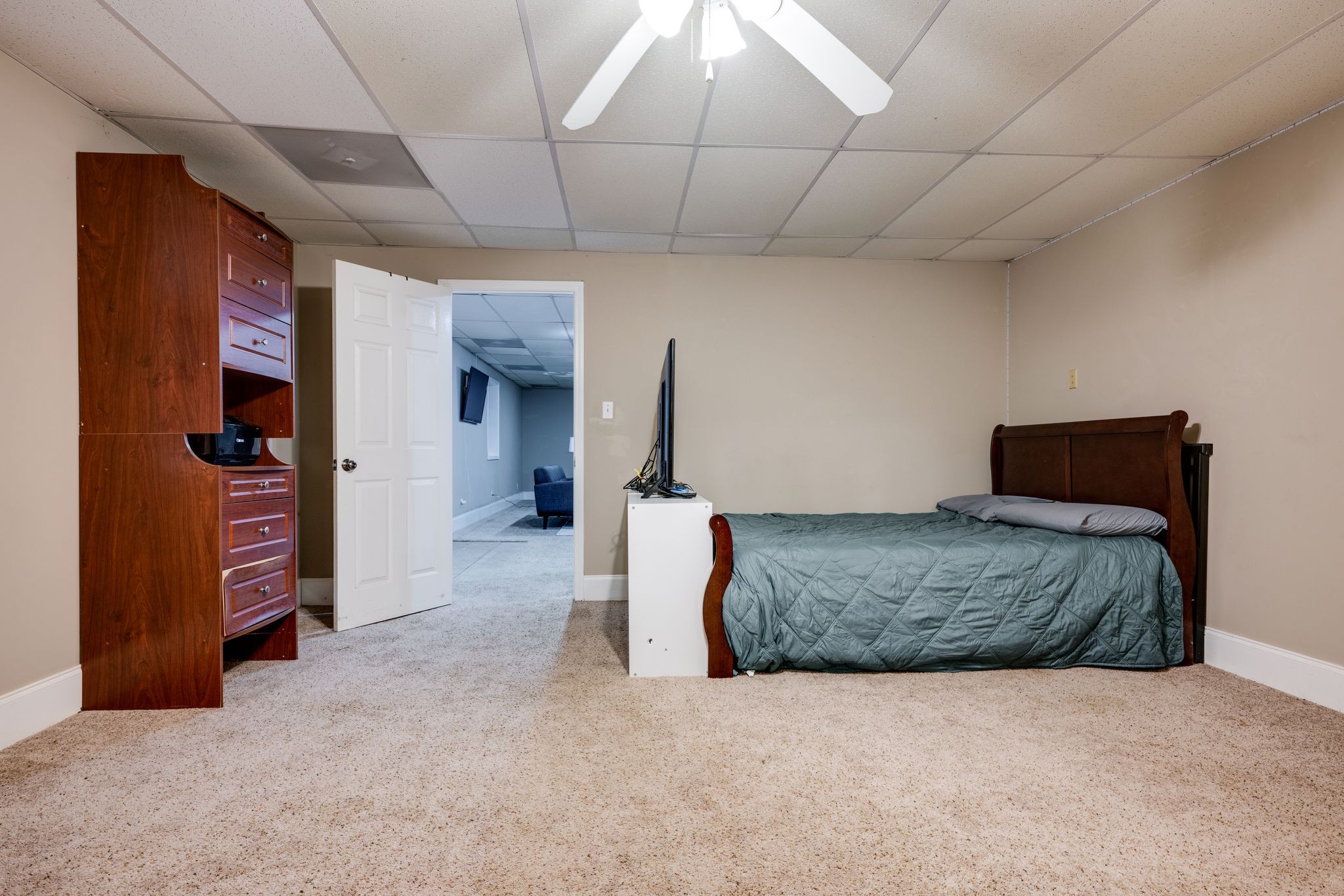 754 Hafner Road Charlotte, TN 37036 - Photo 37 of 54 a living room with furniture and a walk in closet