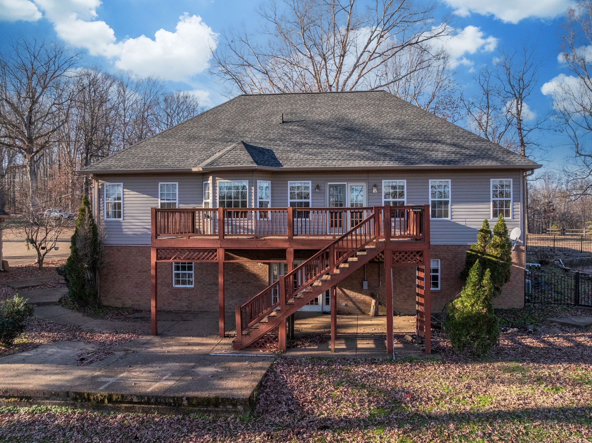 754 Hafner Road Charlotte, TN 37036 - Photo 41 of 54 a view of a house with a yard chairs and table