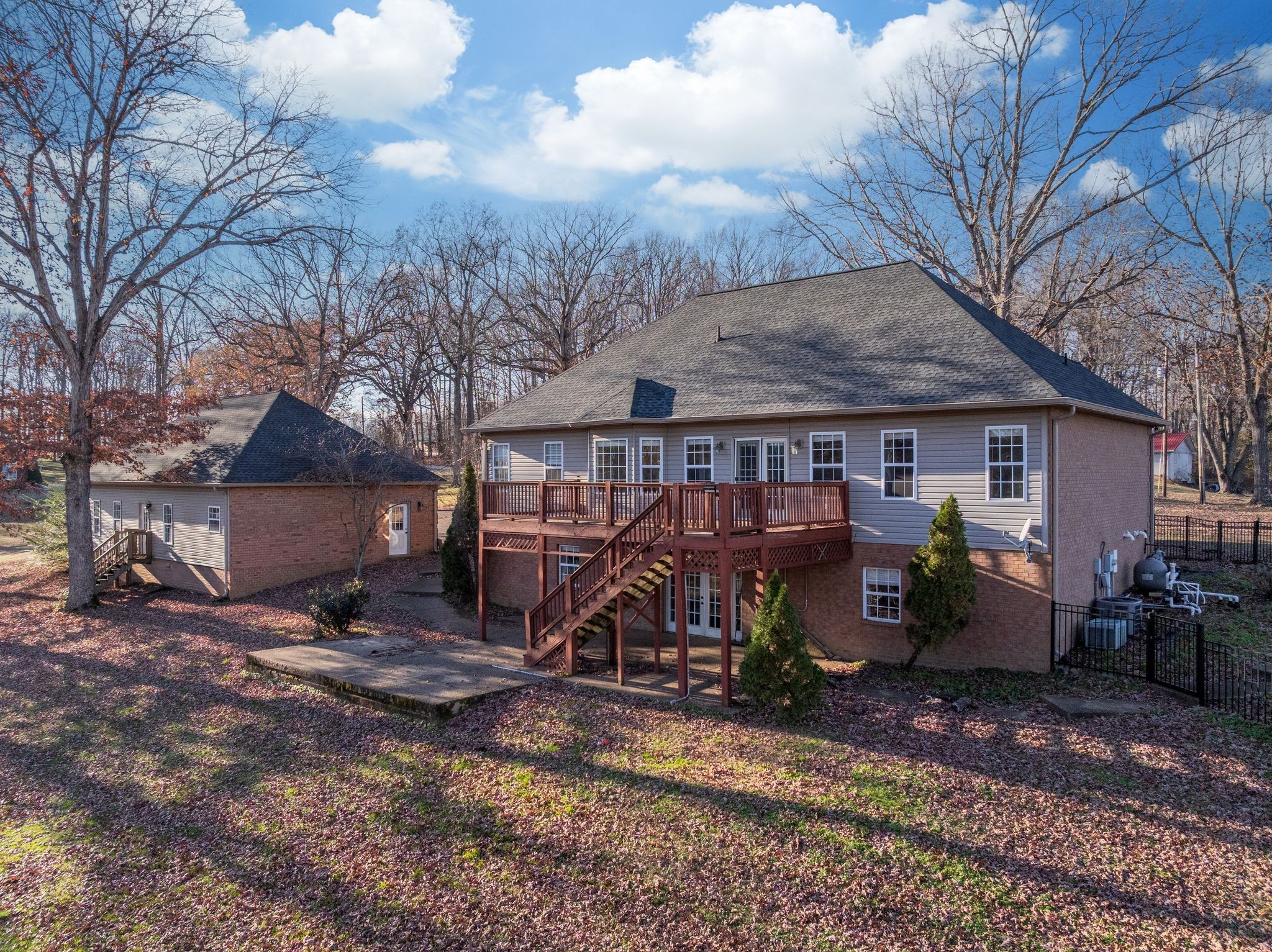 754 Hafner Road Charlotte, TN 37036 - Photo 43 of 54 a view of a house with yard and a patio