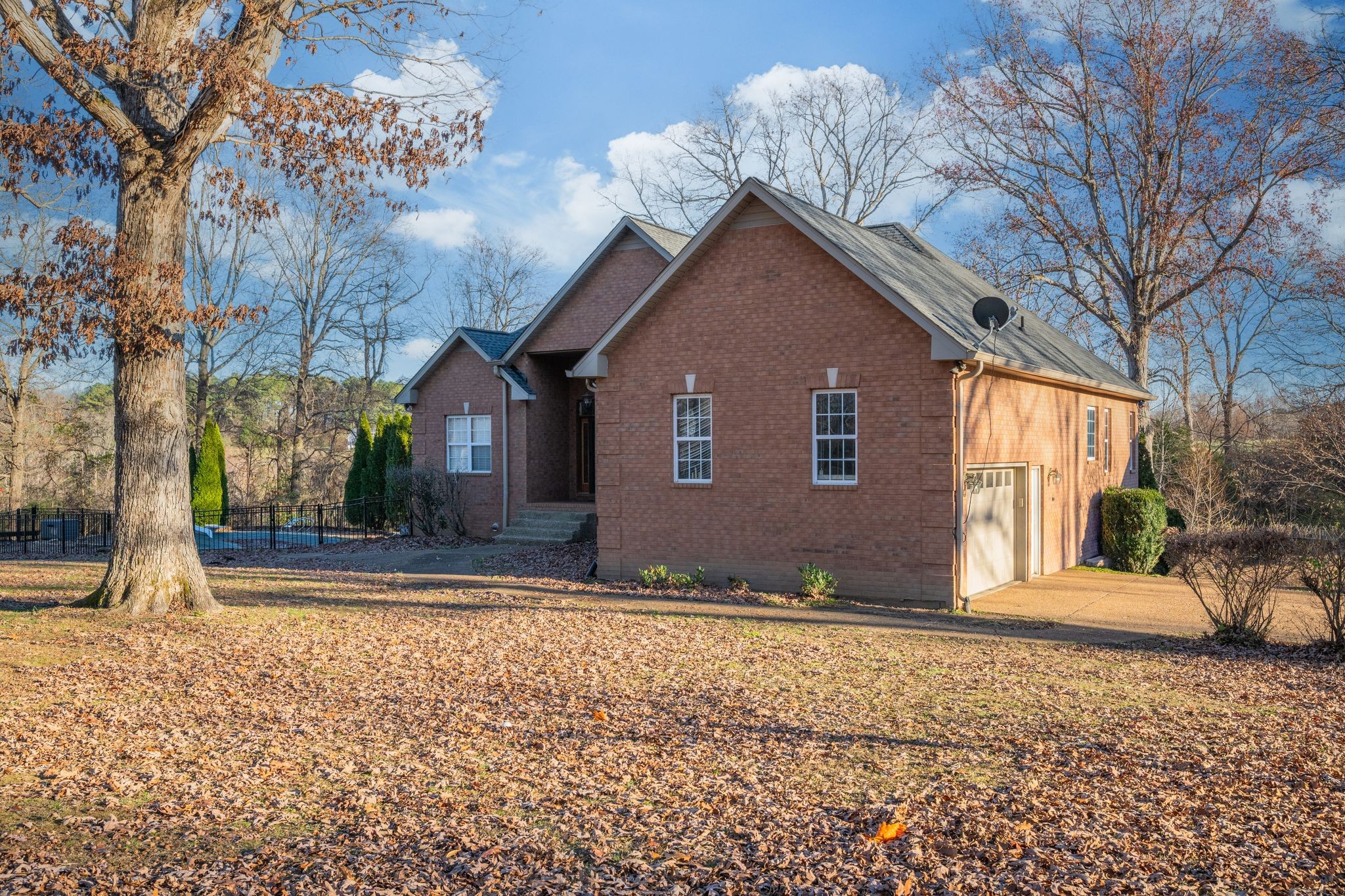 754 Hafner Road Charlotte, TN 37036 - Photo 47 of 54 a view of a house with a yard