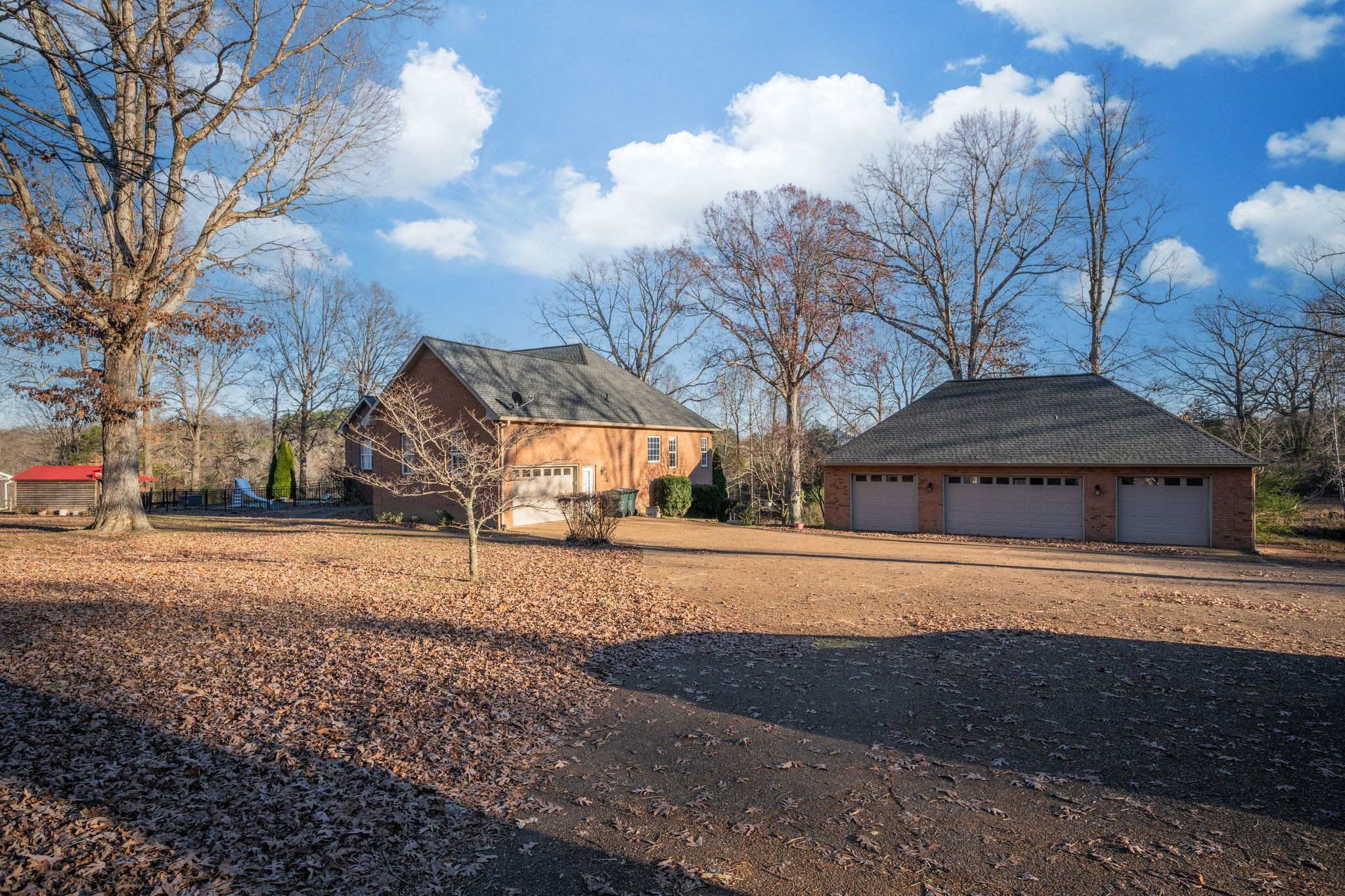 754 Hafner Road Charlotte, TN 37036 - Photo 48 of 54 a view of a house with a yard