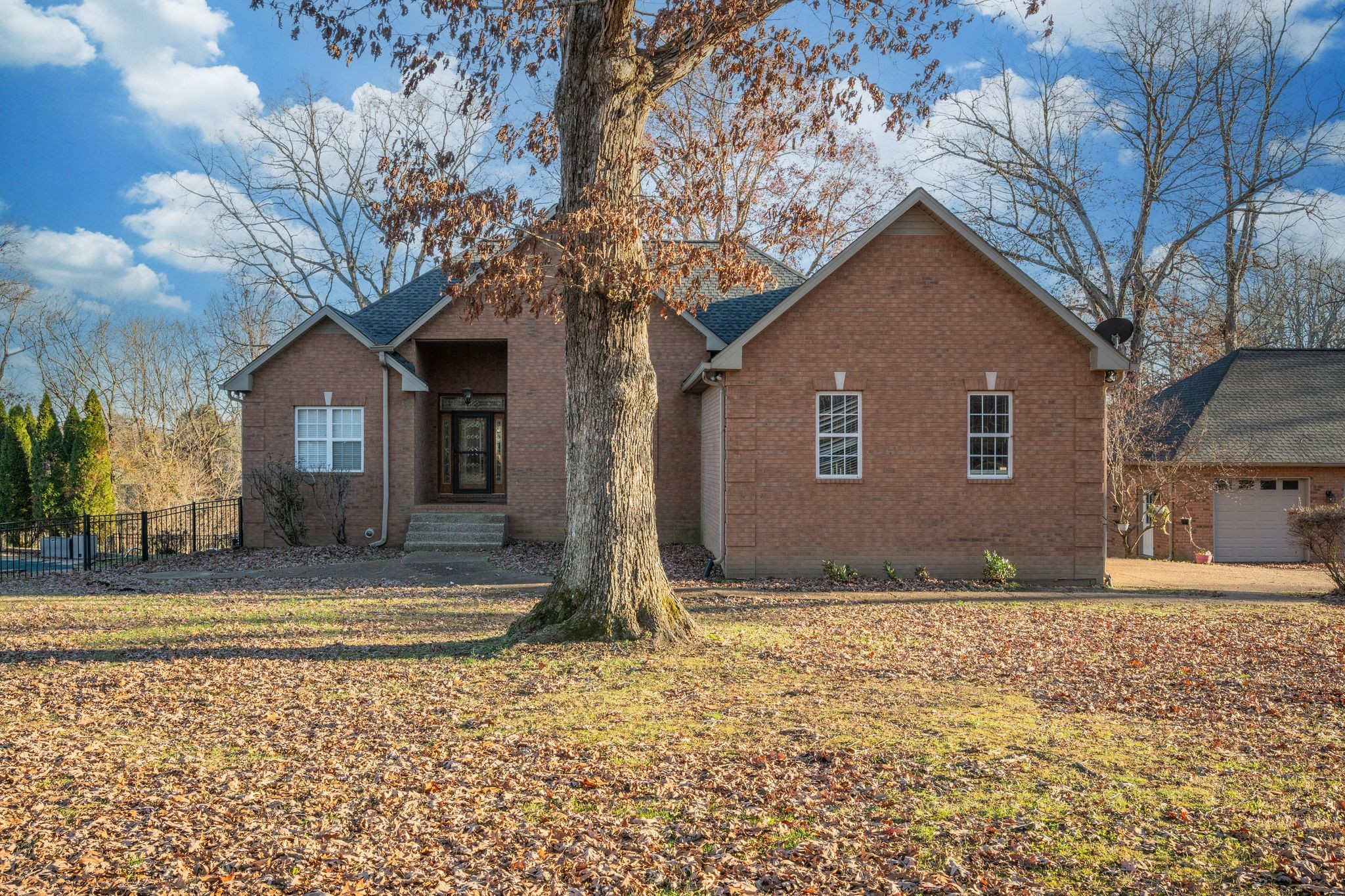 754 Hafner Road Charlotte, TN 37036 - Photo 6 of 54 a front view of a house with a yard