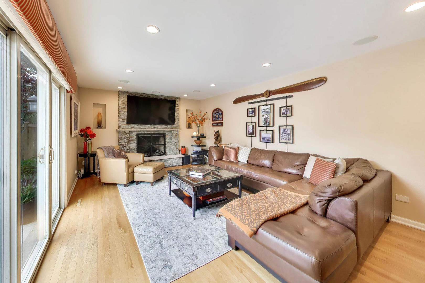 3956 Rutgers Lane Northbrook, IL 60062 - Photo 13 of 41 a living room with furniture or couch and a flat screen tv
