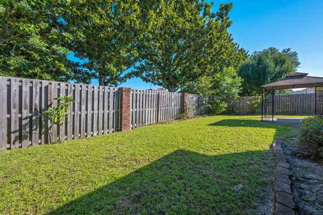 a view of a yard with a small garden