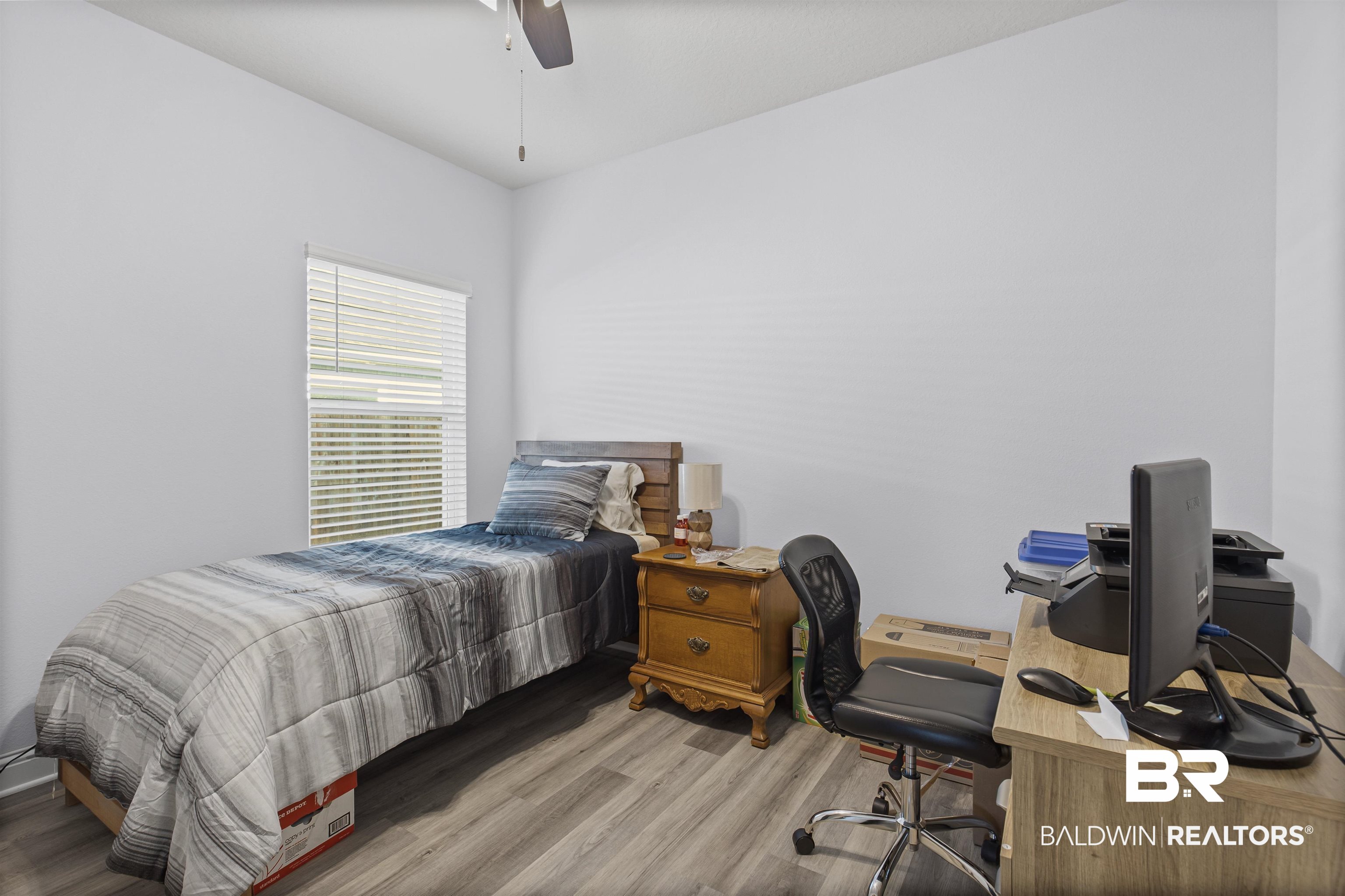 10564 Heirloom Road South Mobile, AL 36608 - Photo 18 of 24 Bedroom with an office area, light wood-style flooring, and ceiling fan