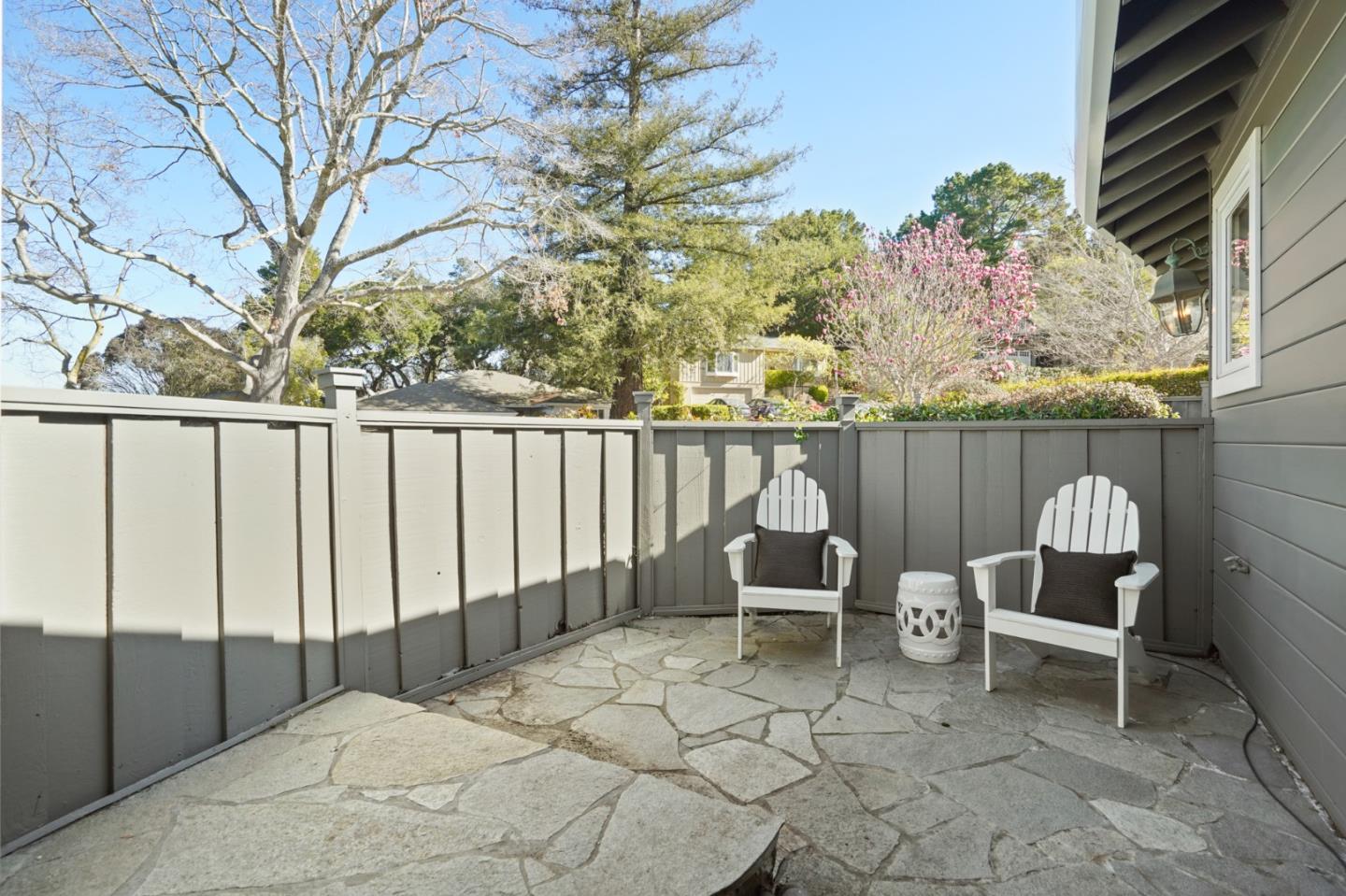 251 Gramercy Drive San Mateo, CA 94402 - Photo 16 of 40 a view of a chairs and table in backyard