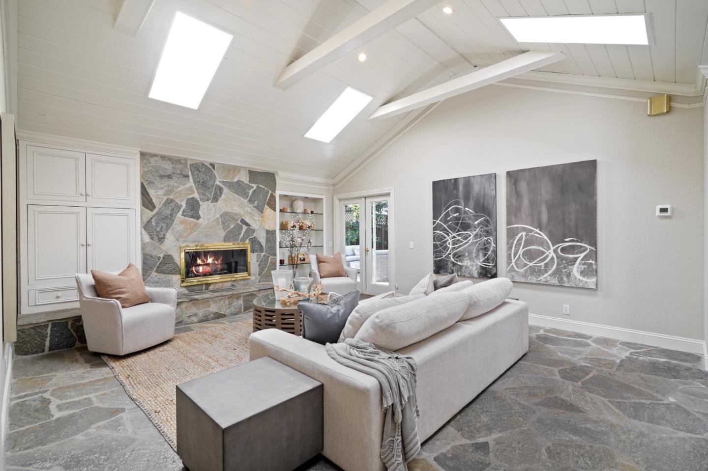 251 Gramercy Drive San Mateo, CA 94402 - Photo 18 of 40 a living room with furniture and a fireplace