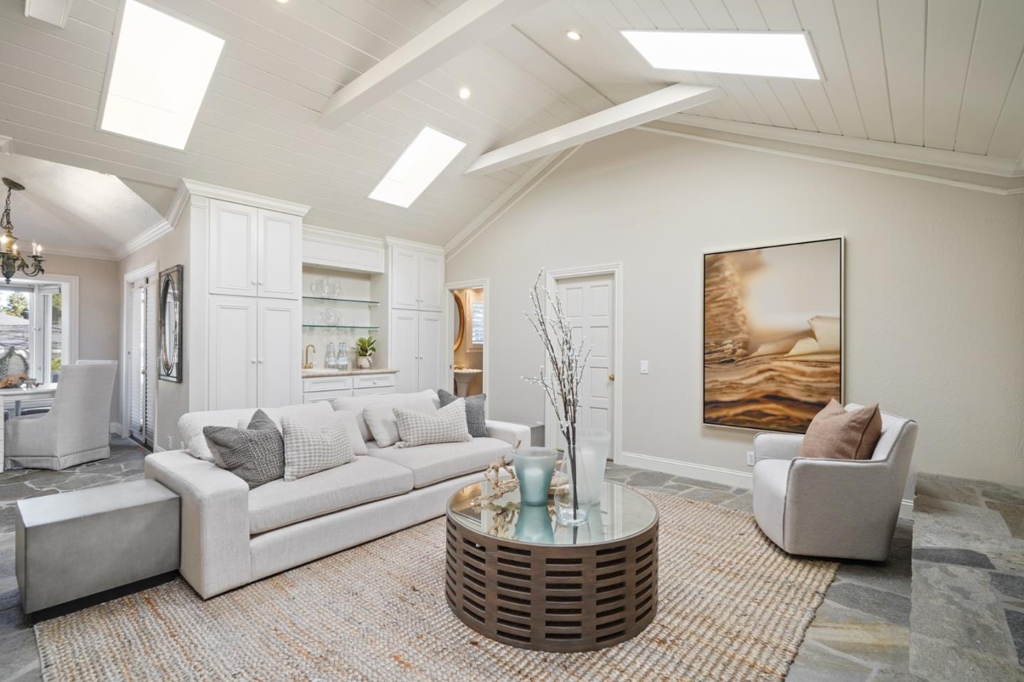 251 Gramercy Drive San Mateo, CA 94402 - Photo 19 of 40 a living room with furniture a lamp and a potted plant