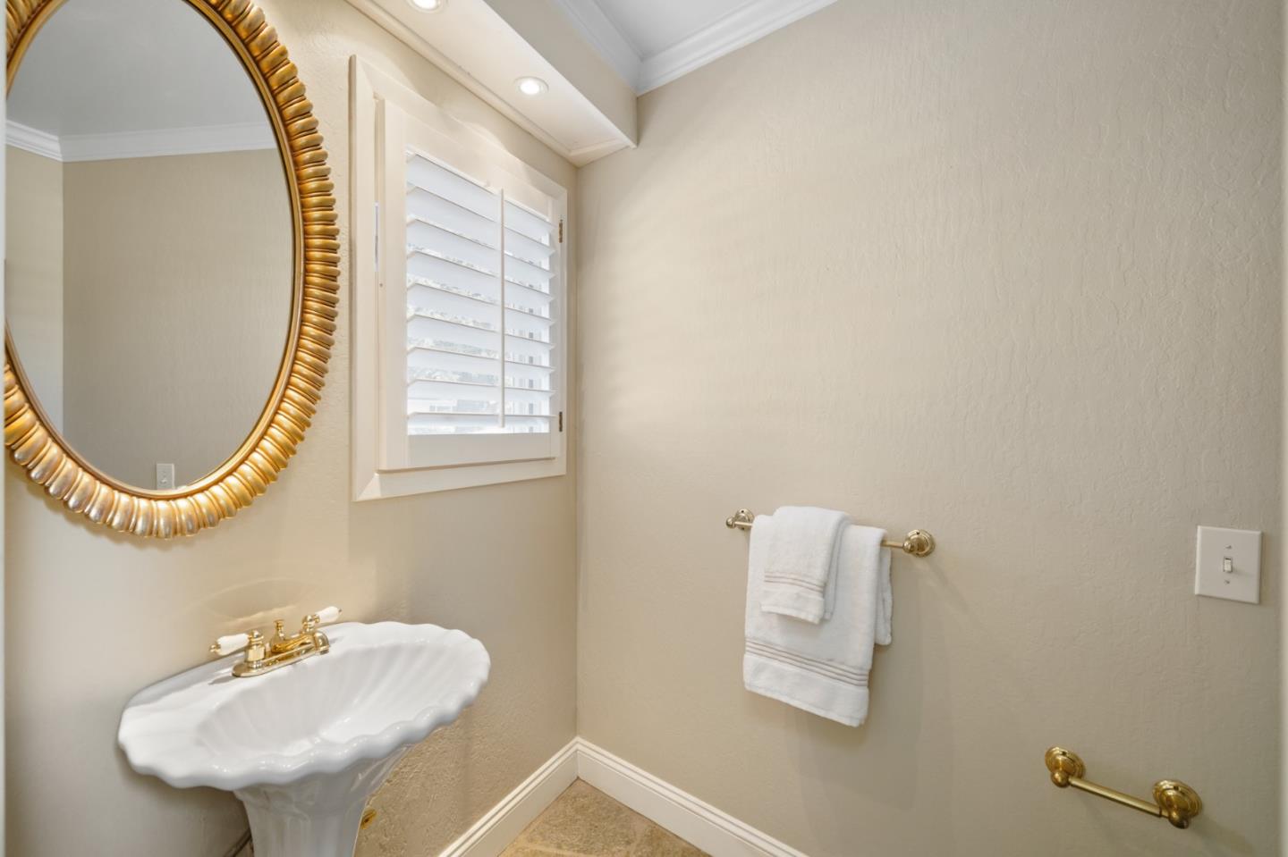 251 Gramercy Drive San Mateo, CA 94402 - Photo 20 of 40 a bathroom with a sink and a mirror