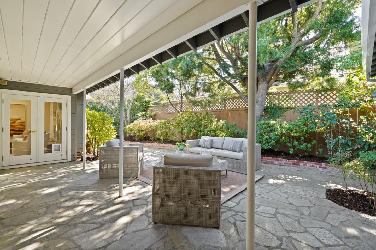 251 Gramercy Drive San Mateo, CA 94402 - Photo 35 of 40 a view of a patio with table and chairs and potted plants