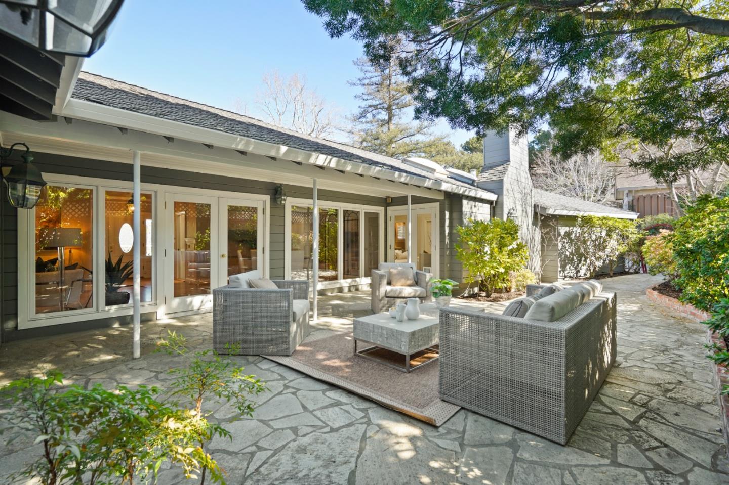 251 Gramercy Drive San Mateo, CA 94402 - Photo 36 of 40 a view of a patio with couches table and chairs and potted plants