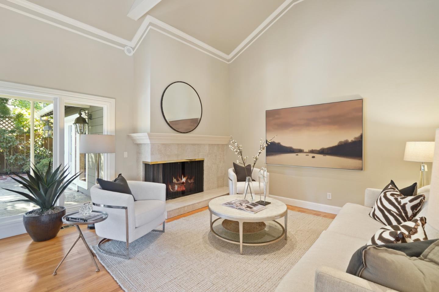 251 Gramercy Drive San Mateo, CA 94402 - Photo 6 of 40 a living room with furniture a fireplace and a potted plant