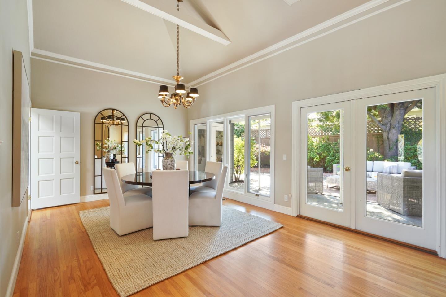 251 Gramercy Drive San Mateo, CA 94402 - Photo 8 of 40 a view of a living room and chandelier with wooden floor