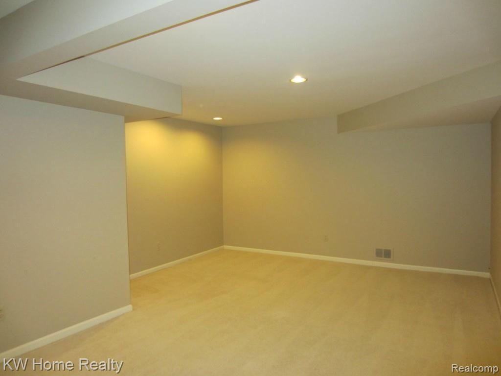 2210 London Bridge Drive, Unit 7 Rochester, MI 48307 - Photo 18 of 21 LONDON-FAMILY ROOM LOWER LEVEL VIEW3.jpg