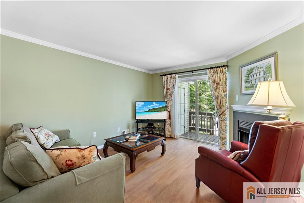 28 Garfield Way Princeton, NJ 08540 - Photo 11 of 39 a living room with furniture and a fireplace