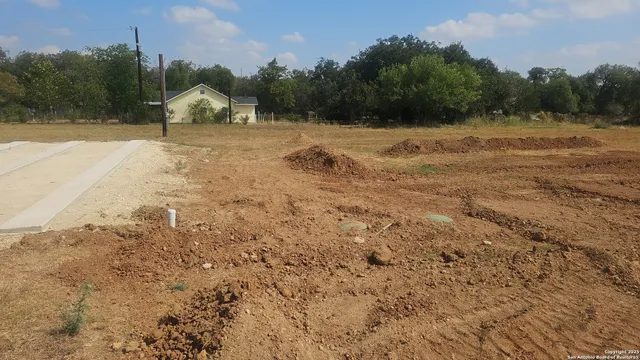 a view of a road with a yard
