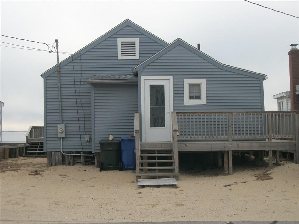 11 Beach Road West Old Saybrook, CT 06475 - Photo 1 of 1 a view of a house with a roof deck