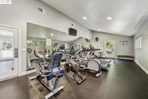 a view of a room with gym equipment