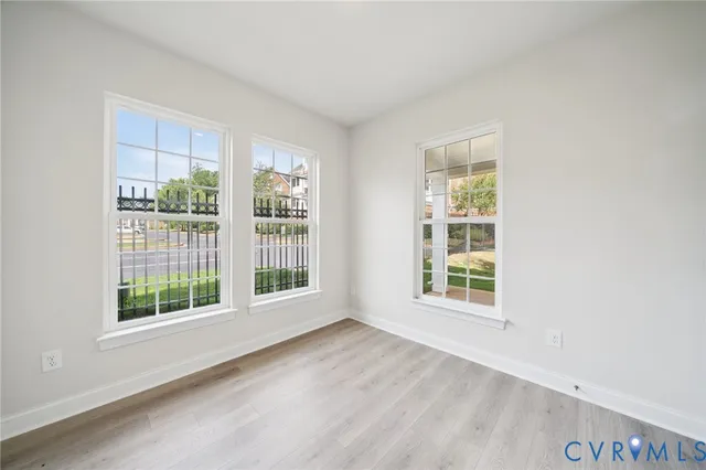 an empty room with windows