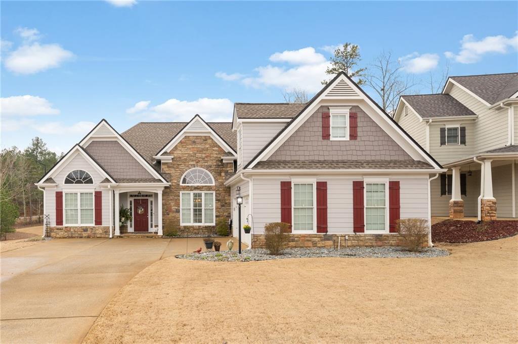 front view of a house with a yard