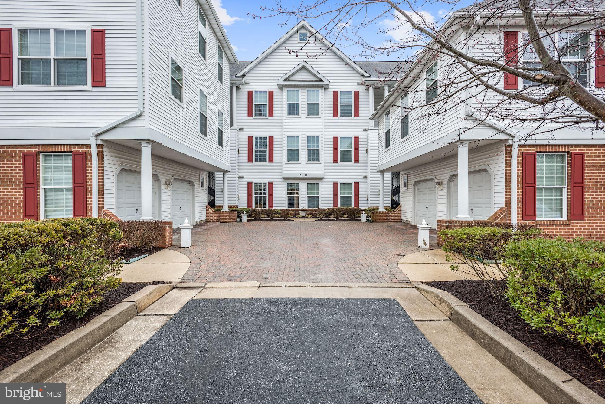 57 Hawk Rise Lane, Unit 304 Owings Mills, MD 21117 - Photo 1 of 17 Front Exterior