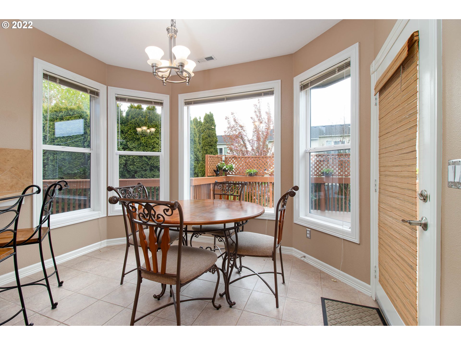 2131 Southeast 12th Avenue Camas, WA 98607 - Photo 13 of 32 a view of a dining room with furniture large windows and wooden floor