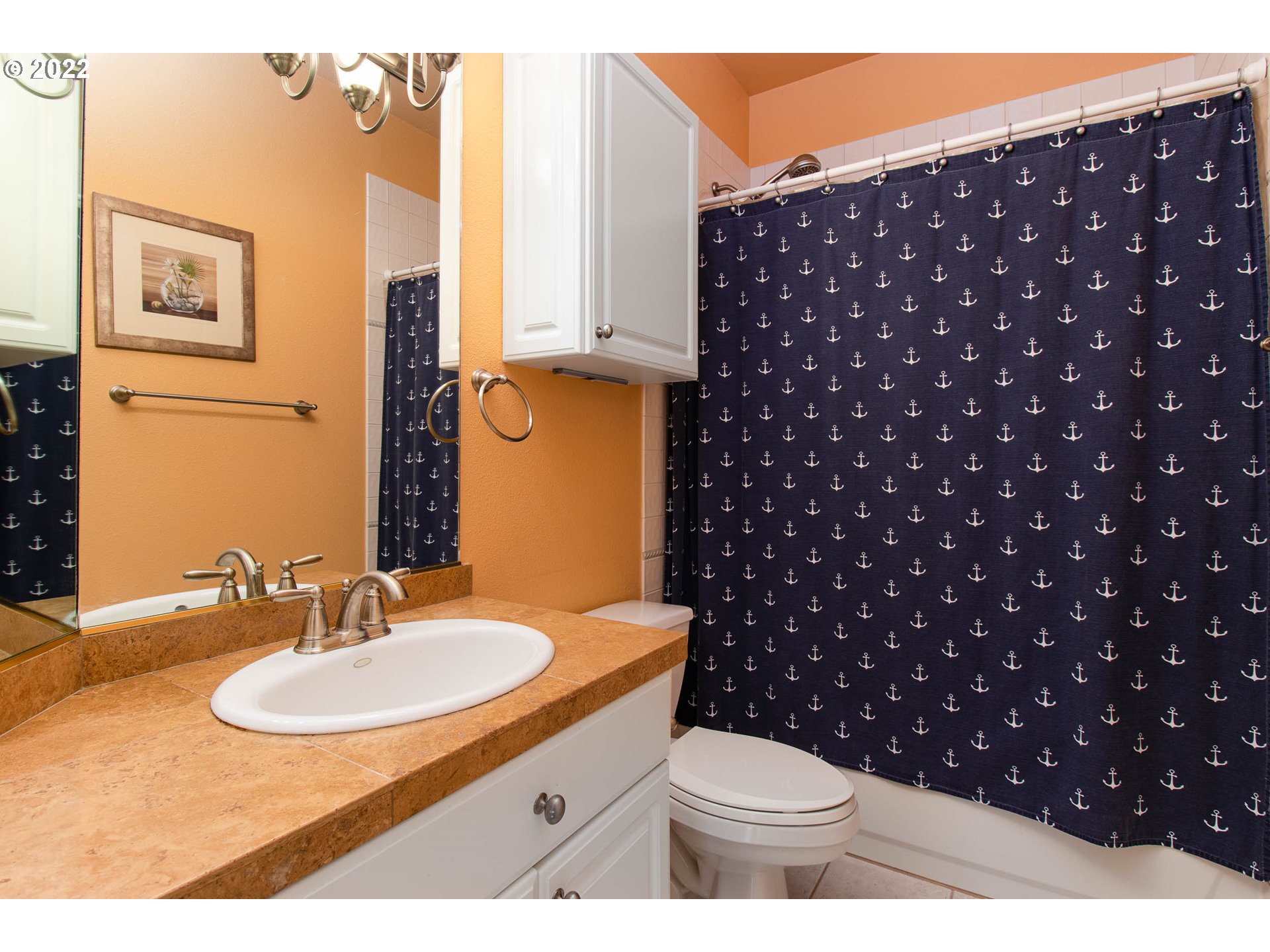 2131 Southeast 12th Avenue Camas, WA 98607 - Photo 20 of 32 a bathroom with a sink vanity mirror and toilet