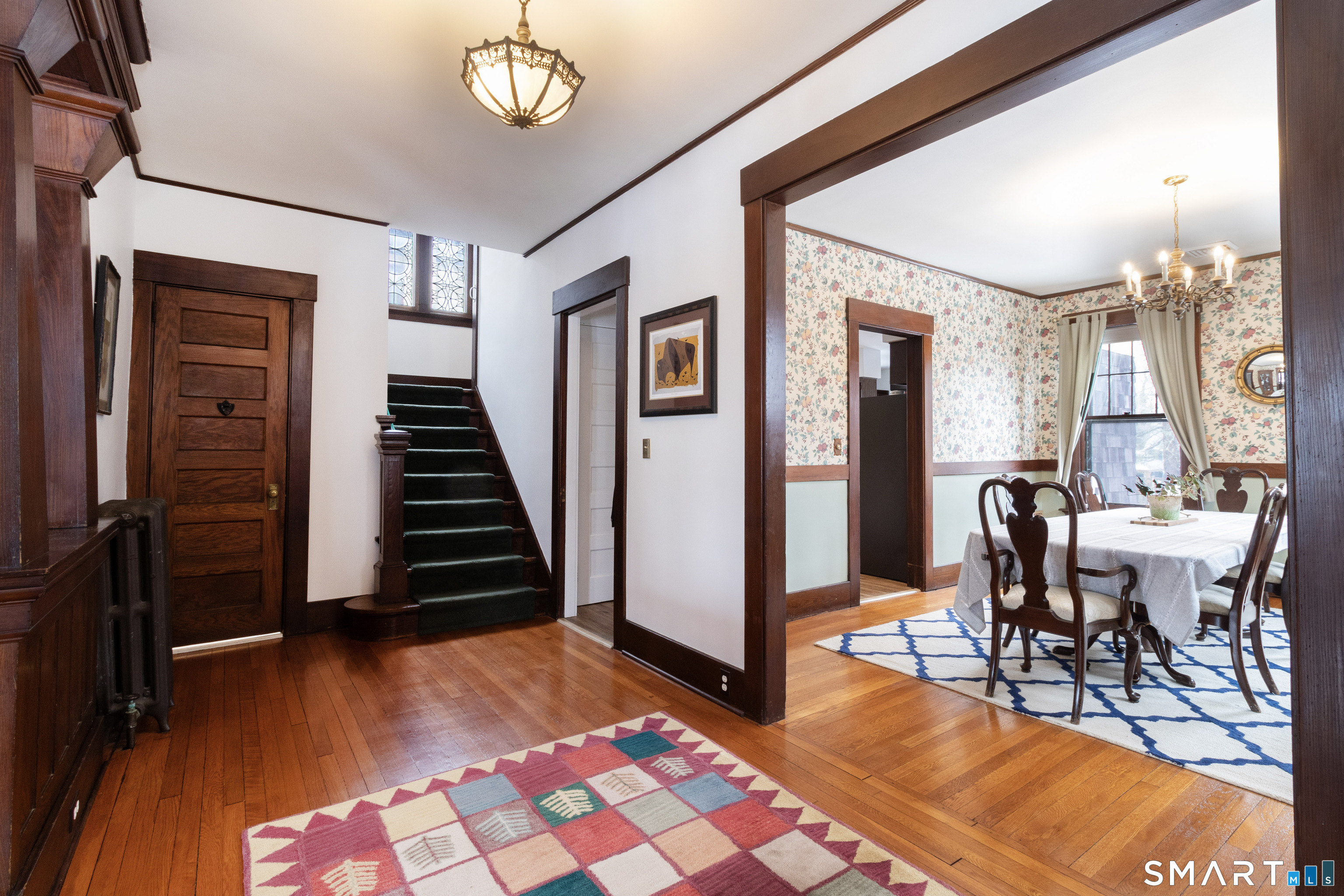 319 South Main Street Wallingford, CT 06492 - Photo 12 of 37 a view of a dining room with furniture and wooden floor