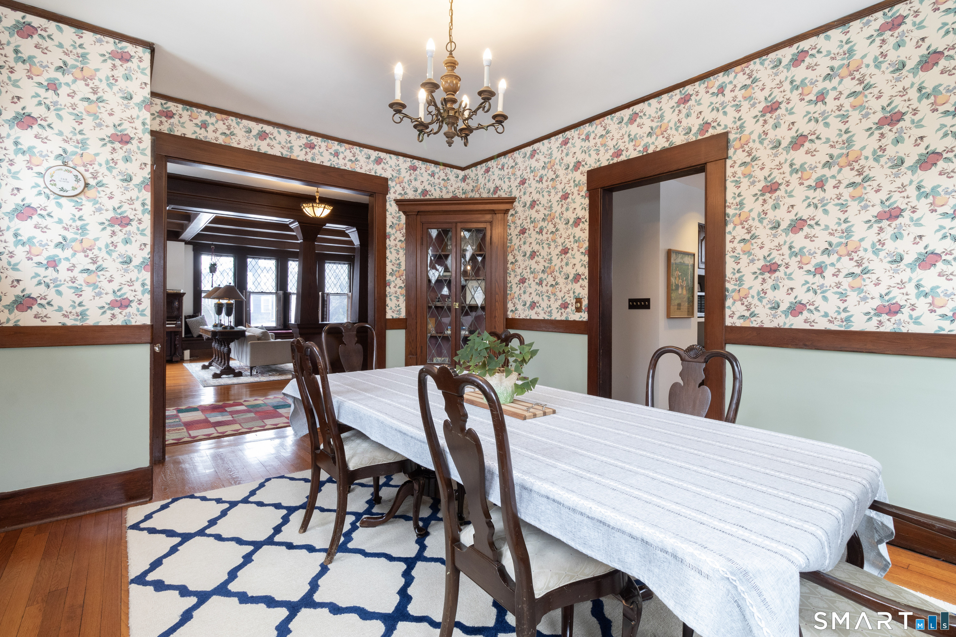 319 South Main Street Wallingford, CT 06492 - Photo 13 of 37 a dining room with furniture a chandelier and window