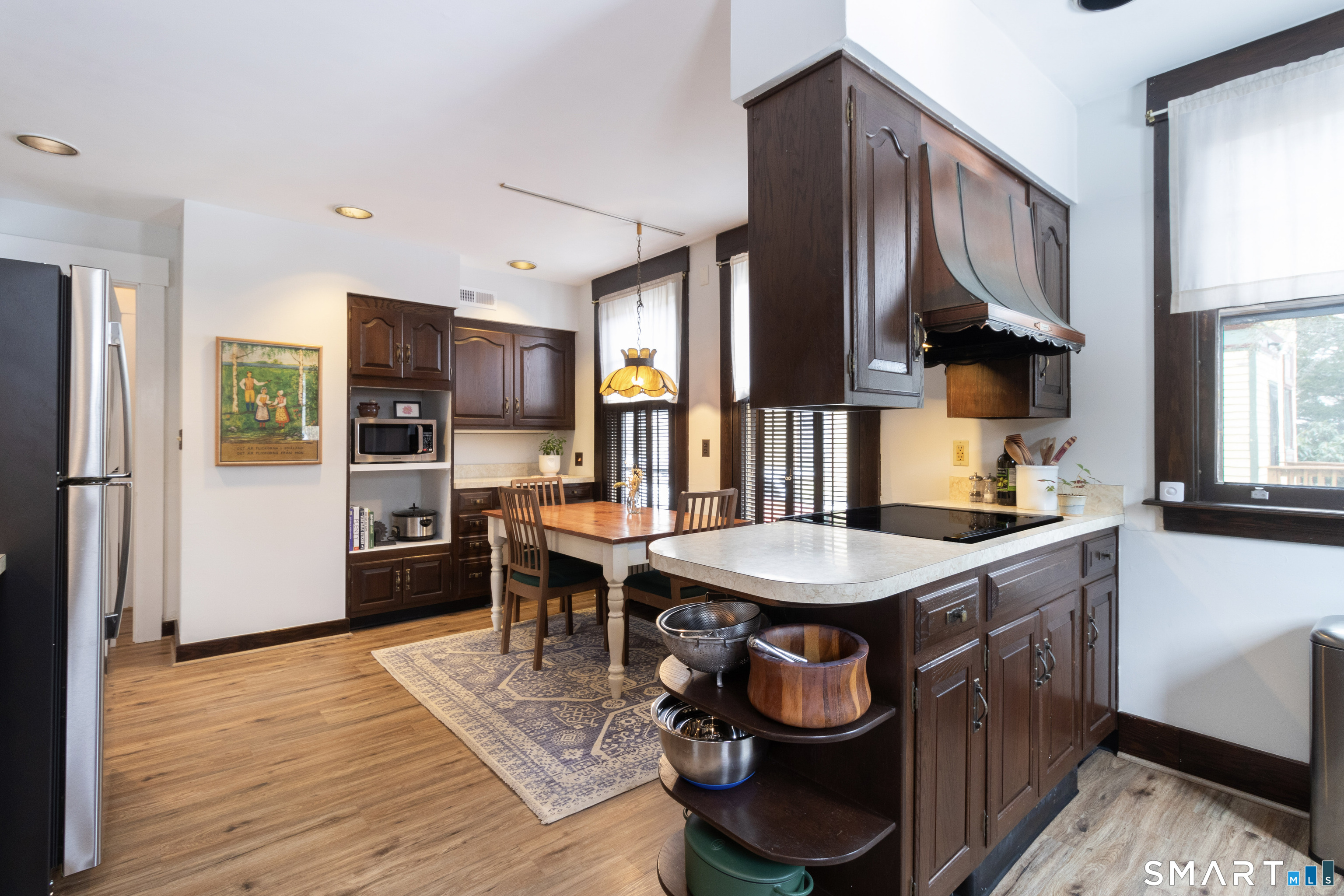 319 South Main Street Wallingford, CT 06492 - Photo 14 of 37 a kitchen with stainless steel appliances granite countertop a sink stove and refrigerator